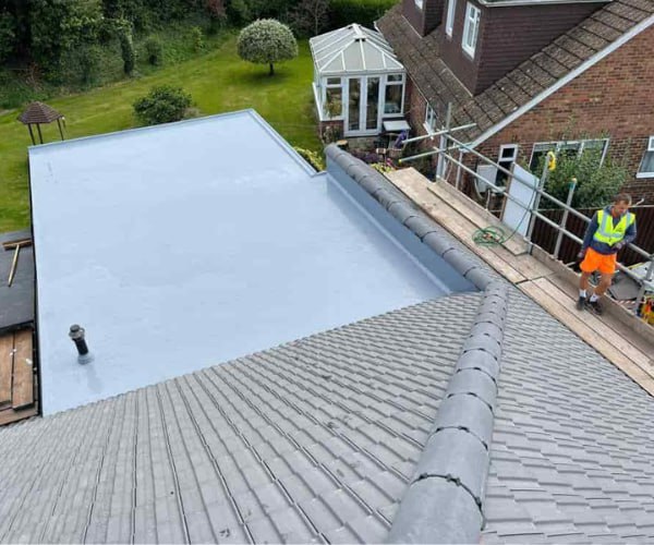 This is a photo of a newly installed hip roof, with a combined liquid covered flat roof. Work carried out by DHT Roofing Cudworth